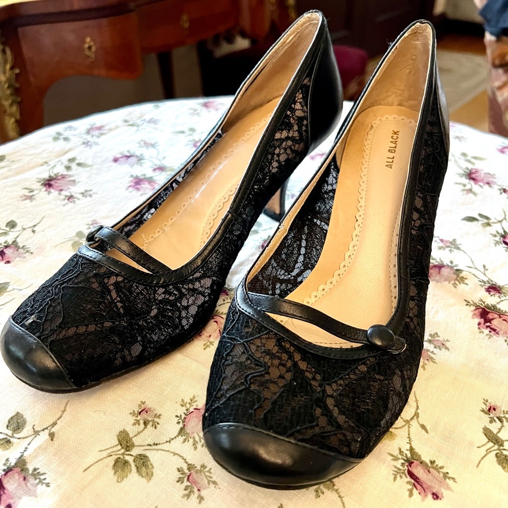 “All Black” brand 2.5 inch black lace and leather heels. Vintage feel.